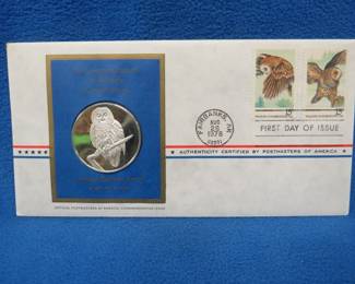 Lot 393. 1978 First Day of Issue cachet with a sterling silver proof medallion weighing approx. 25 grams.