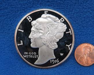 Lot 197. Mercury dime replica. 64.18 grams of .999 silver.