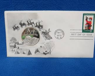 Lot 310. 1972 First Day of Issue cachet with a sterling silver proof medallion weighing approx. 25 grams.