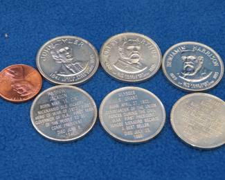 Lot 377. Six Franklin Mint First Edition Presidential Mini coins weighing a total of 46.5 grams.