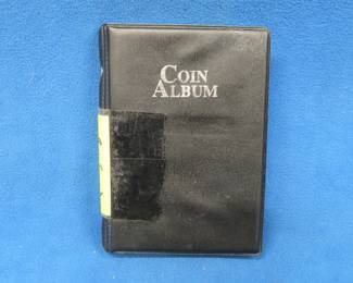 Lot 98. Lincoln error cents and BU cents. 29 total in an album.