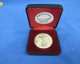Lot 109. 1969 NASA America in Space sterling silver medallion depicting Apollo 12. 26.00 grams.