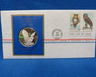 Lot 394. 1978 First Day of Issue cachet with a sterling silver proof medallion weighing approx. 25 grams.