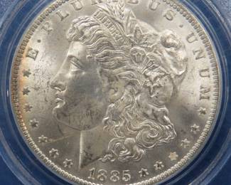 Lot 316. 1885 O Morgan silver dollar graded MS63 by PCGS