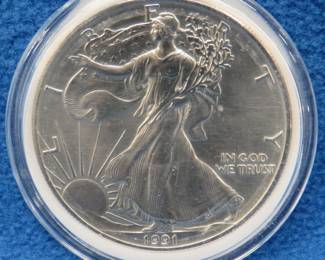 Lot 336. 1991 American Silver Eagle. One ounce of .999 fine silver.