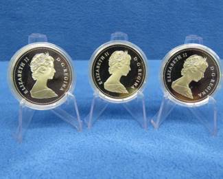 Lot 261. Three 1984 Canadian Proof Silver Dollar each coin has 11.5 grams of fine silver