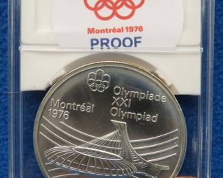 Lot 259. 1976 Montreal Olympics $10.00 sterling silver proof coin. 49.0 grams.