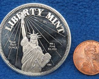 Lot 173. One troy ounce round of .999 silver from the Liberty Mint