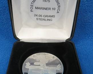 Lot 102. 1975 Postmasters of America sterling silver medallion commemorating Mariner 10. 24.05 grams.