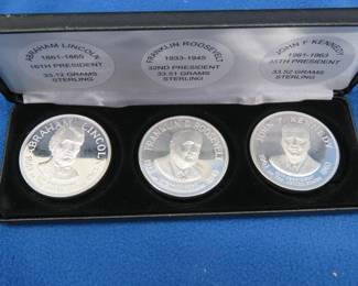 Lot 80. Three sterling Presidential rounds: Abraham Lincoln 33.12 Grams. Franklin Roosevelt 33.52 Grams. John F Kennedy 33.52 Grams.