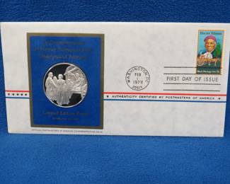 Lot 343. 1978 First Day of Issue cachet with a sterling silver proof medallion weighing approx. 25 grams.