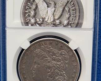 Lot 141. 1880 S Morgan slabbed silver dollar