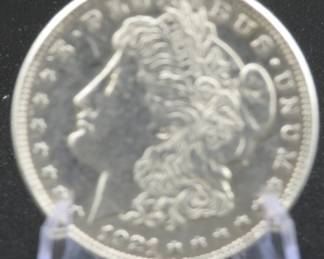 Lot 399. 1921 P Morgan silver dollar