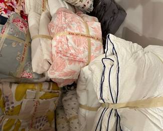 Lots of nice cotton, down, etc. linens. All bundled and priced one to five dollars.