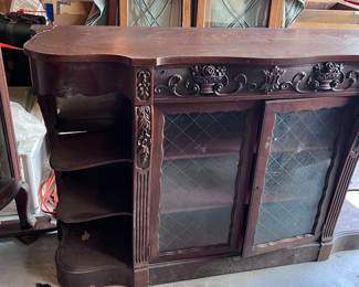 Antique buffet with shelves and glass doors