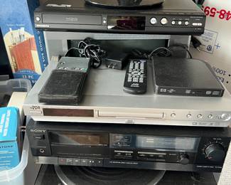 Stereo components Sony, Quartz turntable, QVC, and Magnavox. 