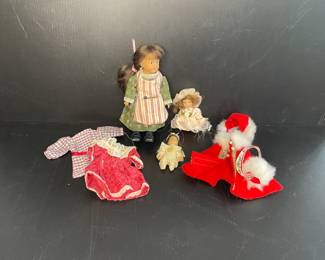 American doll and assorted clothing