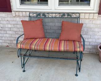 Outdoor bench with cushion