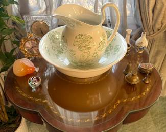 Antique pitcher with basin and clover table