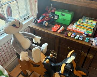 Wooden hand-carved rocking cow