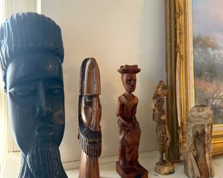 Hand carved wooden head statues