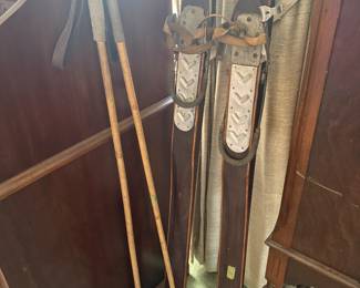 Antique 78” Skirite wooden skis w/leather and metal bindings, matching  poles