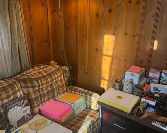 MCM swag lamp, sofa and lots of paper