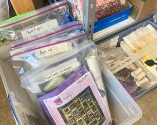 Quilt kits, some partially finished.