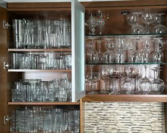 CABINET OF GLASSWARE | Large cabinets full of mixed glassware including; water glasses, wine glasses, beer glasses, rocks glasses and more!