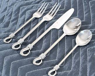 SILVERWARE SERVICE FOR 12 | Silverware service for 12 including: 12 knives, 12 dinner forks, 12 salad forks, 12 soup spoons & 12 dessert spoons.
