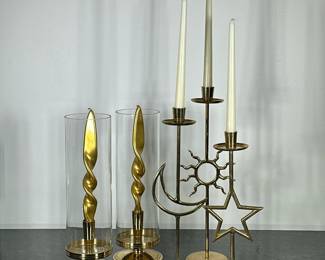 (5pc) BRASS CANDLESTICKS | Pair of brass candlesticks with glass and set of 3 tall brass candlesticks with Moon, Sun, and Star . - h. 16 x w. 5 in (tallest)