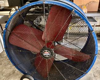 4 feet high massive industrial fan for cooling or drying. 