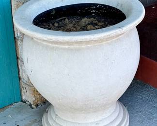 Large flower pots all over the property 