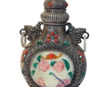 Antique Chinese 20th Century Carved Silver Bottle with Carved Hard Stone Detailing 

Accented with malachite, red coral and more 

Measures 14" tall 