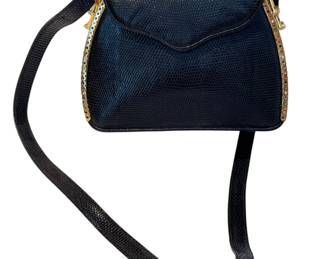 Vintage Judith Leiber Handbag Snakeskin Expandable with Bejeweled Trim 

In very good condition and measures about 8" w x 6.25" h 