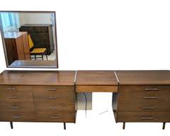 Paul McCobb for Calvin Linear 3pc Dresser with Vanity Mirror.

Unknown if the wall mirror matches but looks nice with the set. There are surface scratches, nicks and general light wear. Please see photos for additional details.

Measures 109” x 19” and 33.5” high.
