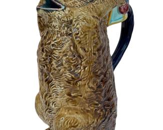 Antique Joseph Holdcroft Majolica Bear with Drum Pitcher 

Measures about 8.43" x 5" x 3.63" 