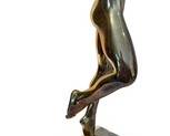 Artisan Bronze Nude Sculpture by Roger M. Brodin 

Number 3/20

Signed R.M. Brodin. 

Roger M. Brodin was an American Postwar & Contemporary artist who was born in 1940. Roger M. Brodin's work has been offered at auction multiple times. He died in 1995.

Measures 19.25" tall with the base

Dated 10/1982