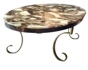 Vintage Aragonite Coffee Table

Elegant design with Hollywood regency style metal scrolled legs paired with a stunning table top reminiscent of lace agates. Truly a gorgeous focal point! 

Measures 70.5" l x 32" d x 16" 