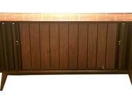 Mid Century Modern Zenith Stereo Turnable Console

Measures 64 x 21 x 28 inches. 