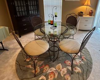 Glass top metal base round table with 4 chairs