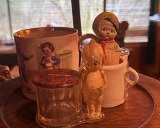 Antique kewpie coin bank