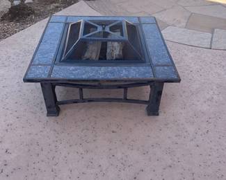 3x3 wood burning outdoor fireplace.  18 inches tall