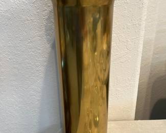 Antique Artilly Shell that is repurposed as a vase