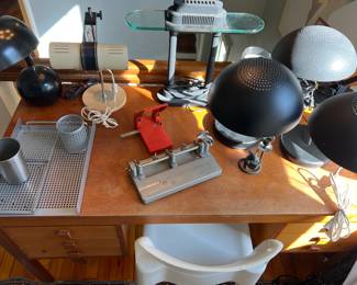 Vintage office desk, office supplies, and desk lamps 