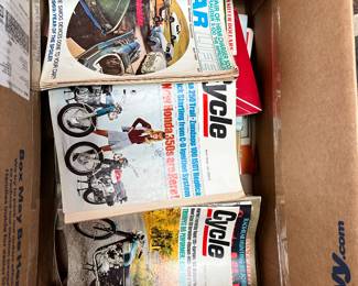 Lots of vintage magazines, motorcycle car magazines