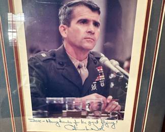 Oliver north signed photo 