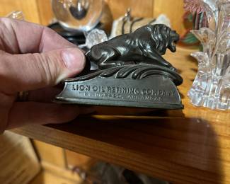 vintage lion oil refining paper weight 