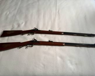 2-vintage Thompson center arm 50 cal black powder guns