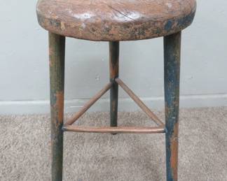 Three legged wooden stool